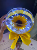 Girasol en pecera - Florería Violeta