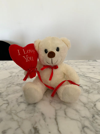 Osito de peluche con globo